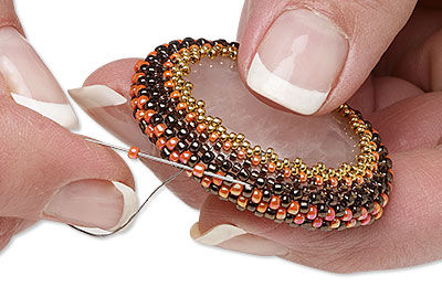 Needle adding to Cabochon set in seed beads